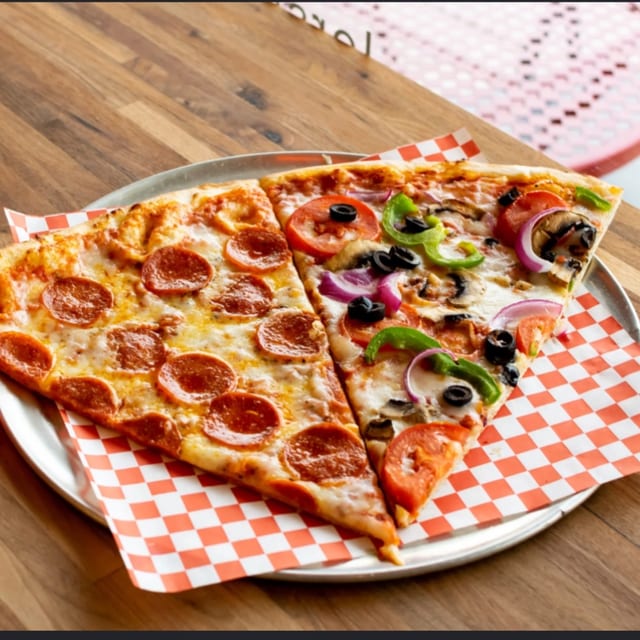 2 Slices With Any Toppings & Drink.